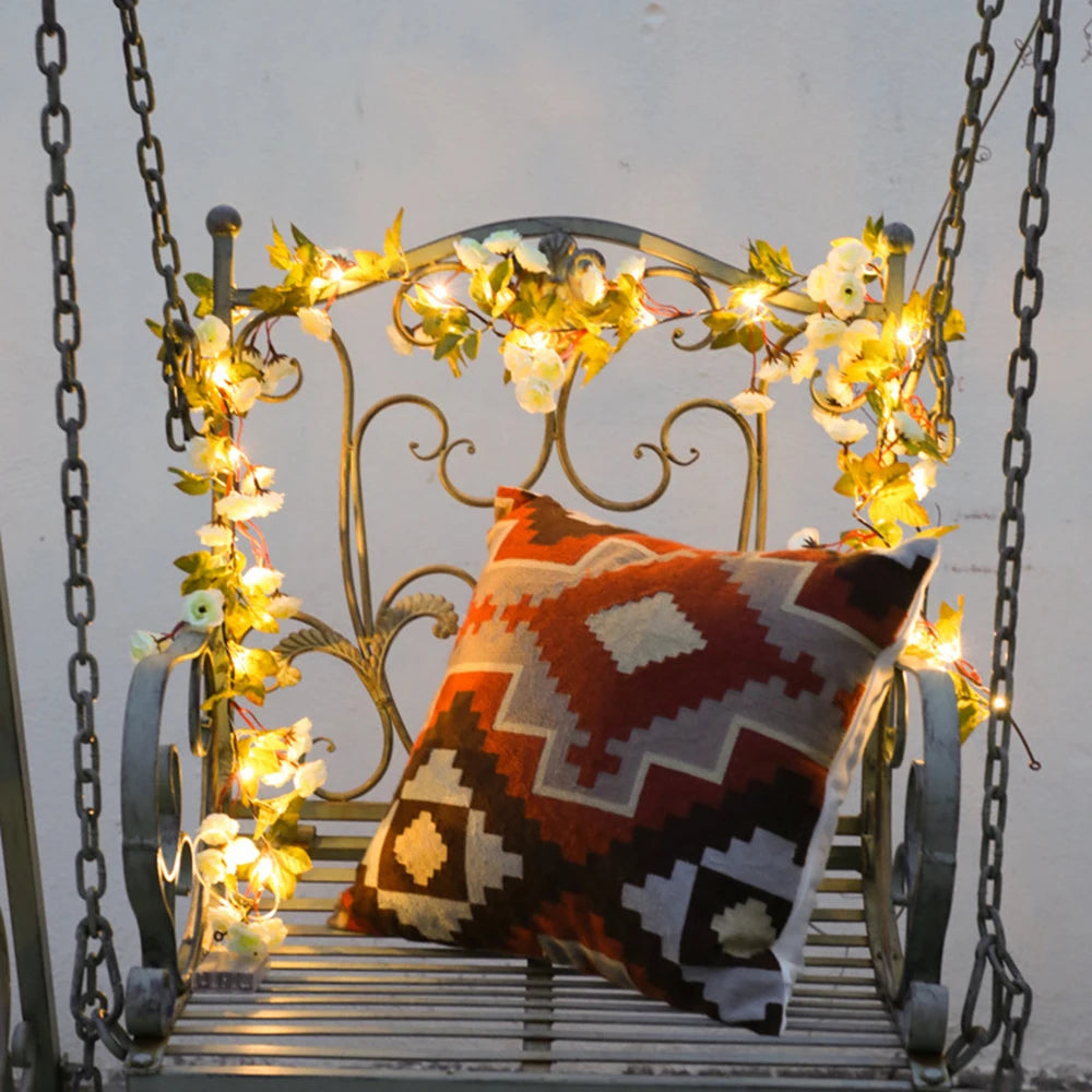 Mağazam Decorative Swing Seat with String Lights and a Patterned Throw Pillow for Cozy Outdoor Spaces