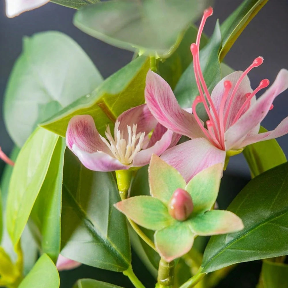 Colorful artificial azaleas indoor decor with vibrant pink flowers and lush green leaves
