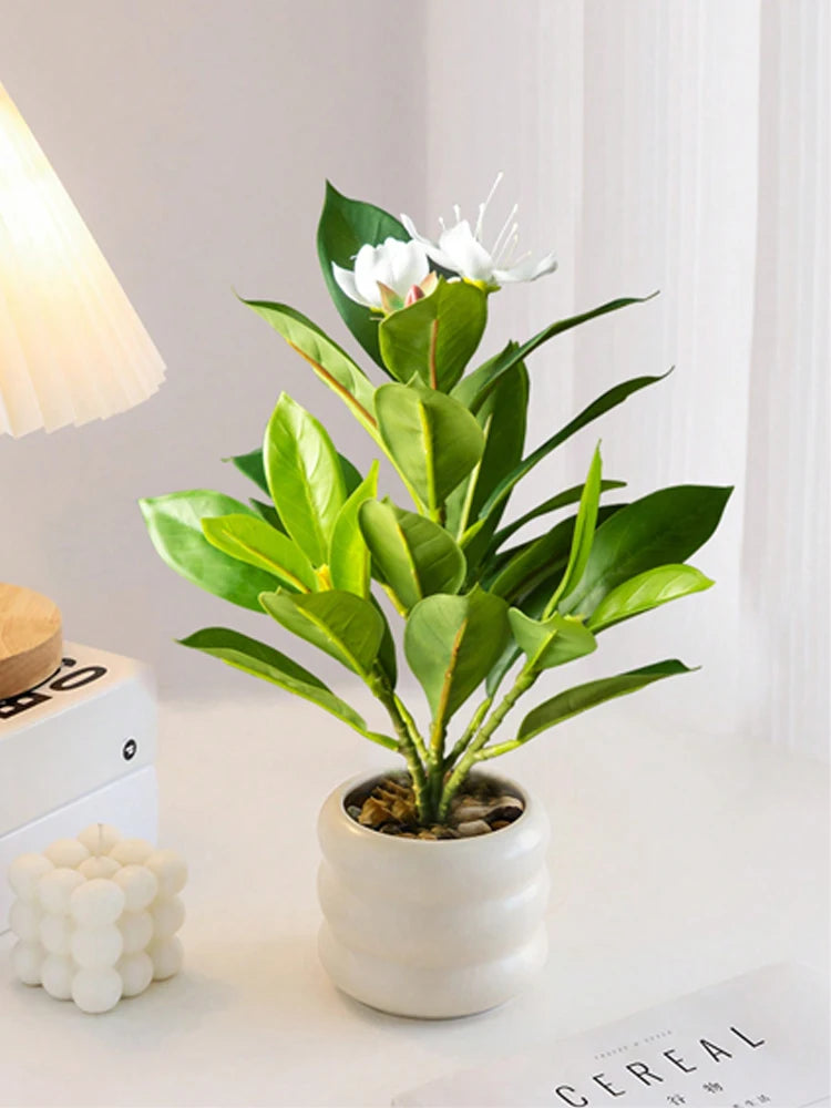 artificial azaleas indoor decor in a white pot with vibrant green leaves and flowers