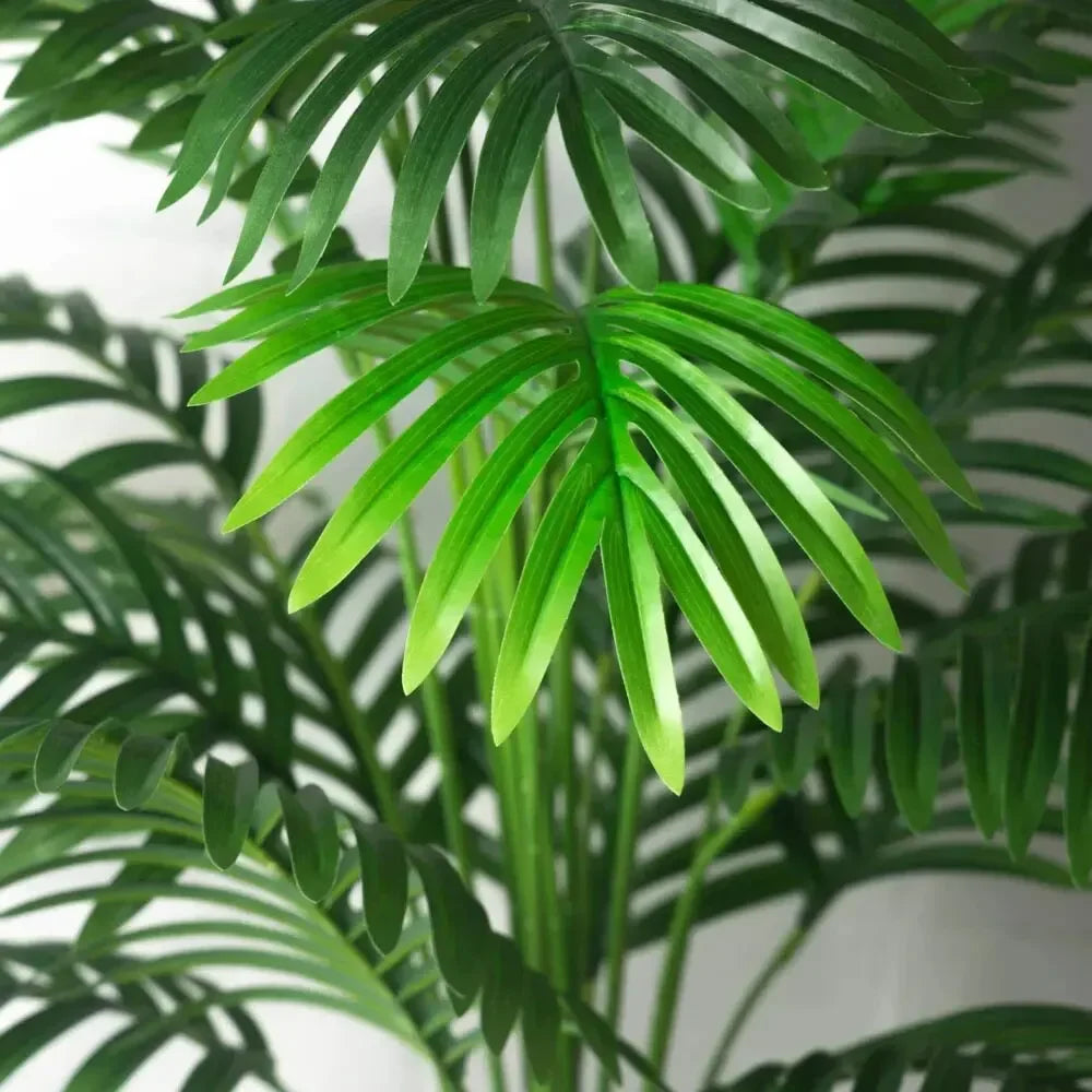 Lush green artificial bonsai tree features realistic leaves for home or office decor