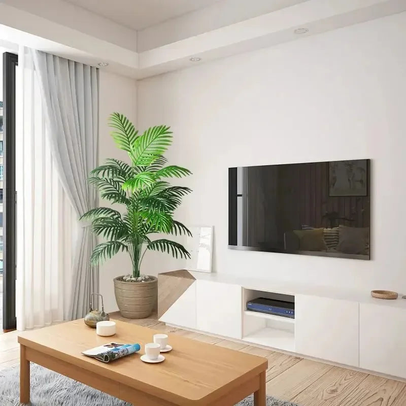 Artificial bonsai tree in a stylish living room setting next to a modern TV and coffee table