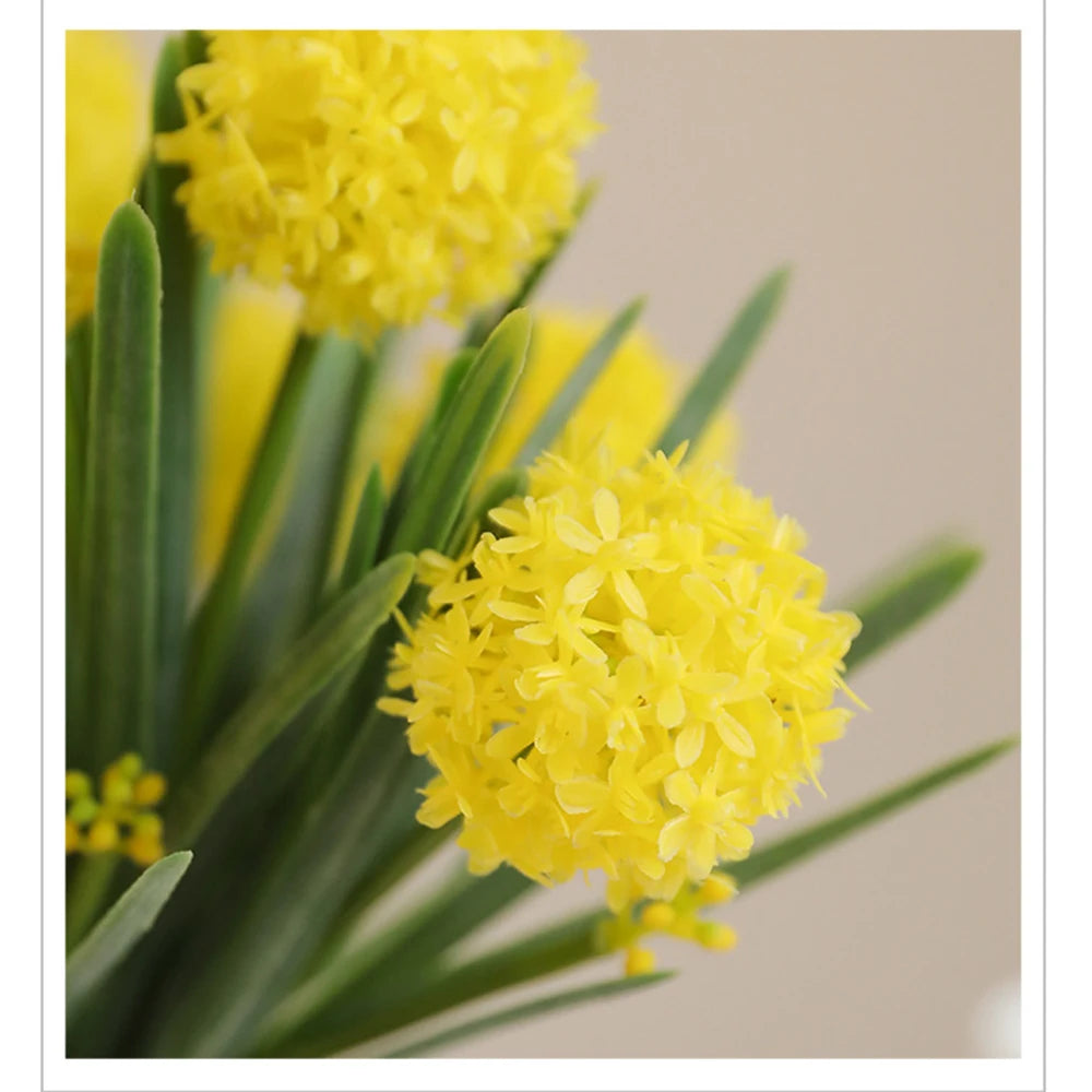 Bright yellow artificial dandelion bouquet with realistic flower details and green stems