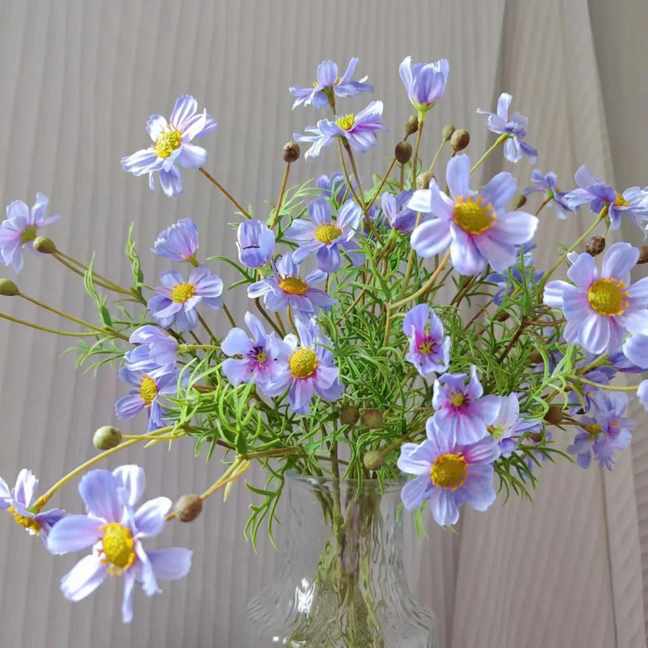 Artificial lavender flower bouquet in a glass vase, perfect for home decoration