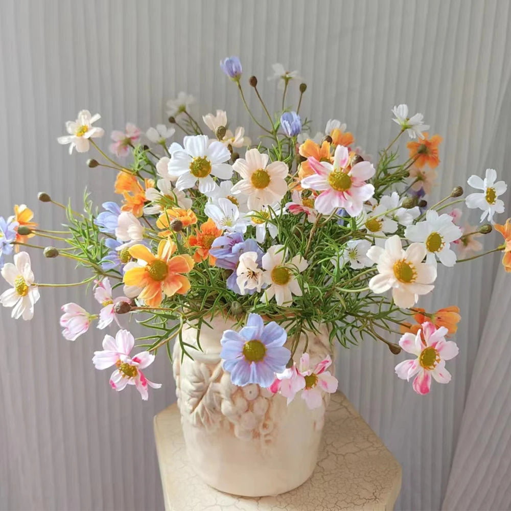Colorful artificial flower bouquet in a decorative vase for home decor accents
