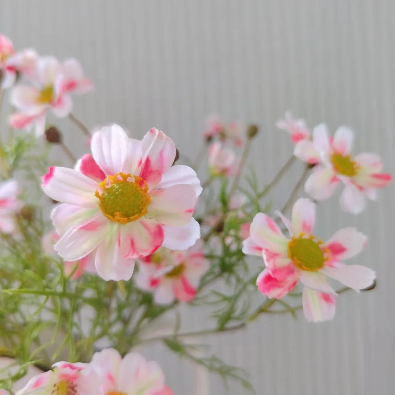 Artificial pink and white daisies in a vase for home decor by Mağazam