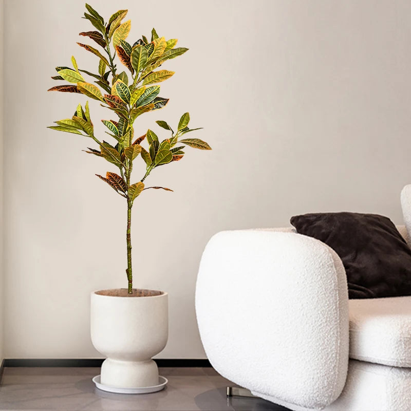 Artificial Croton Plant in a White Pot for Home Decoration and Interior Styling