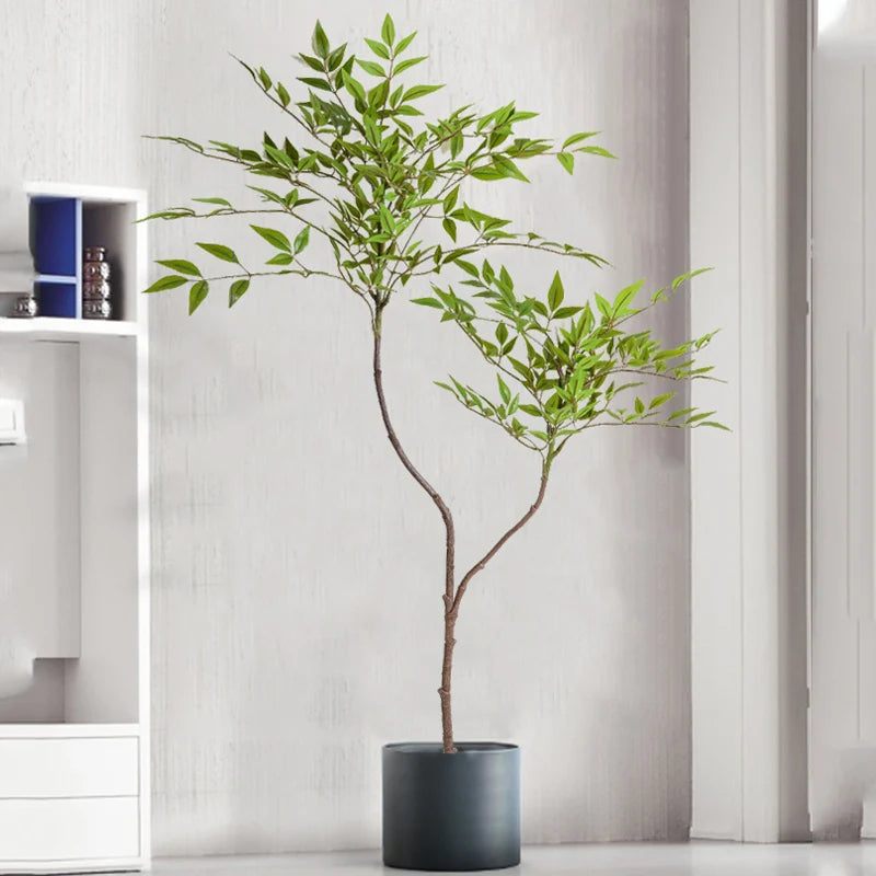 Artificial potted tree with green leaves in a stylish black planter for home decor