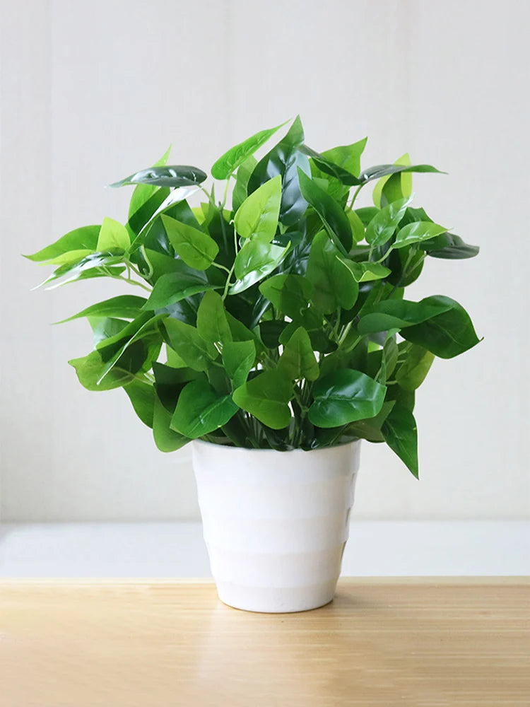 Artificial Green Potted Plant in White Ceramic Pot for Home Decor and Indoor Spaces