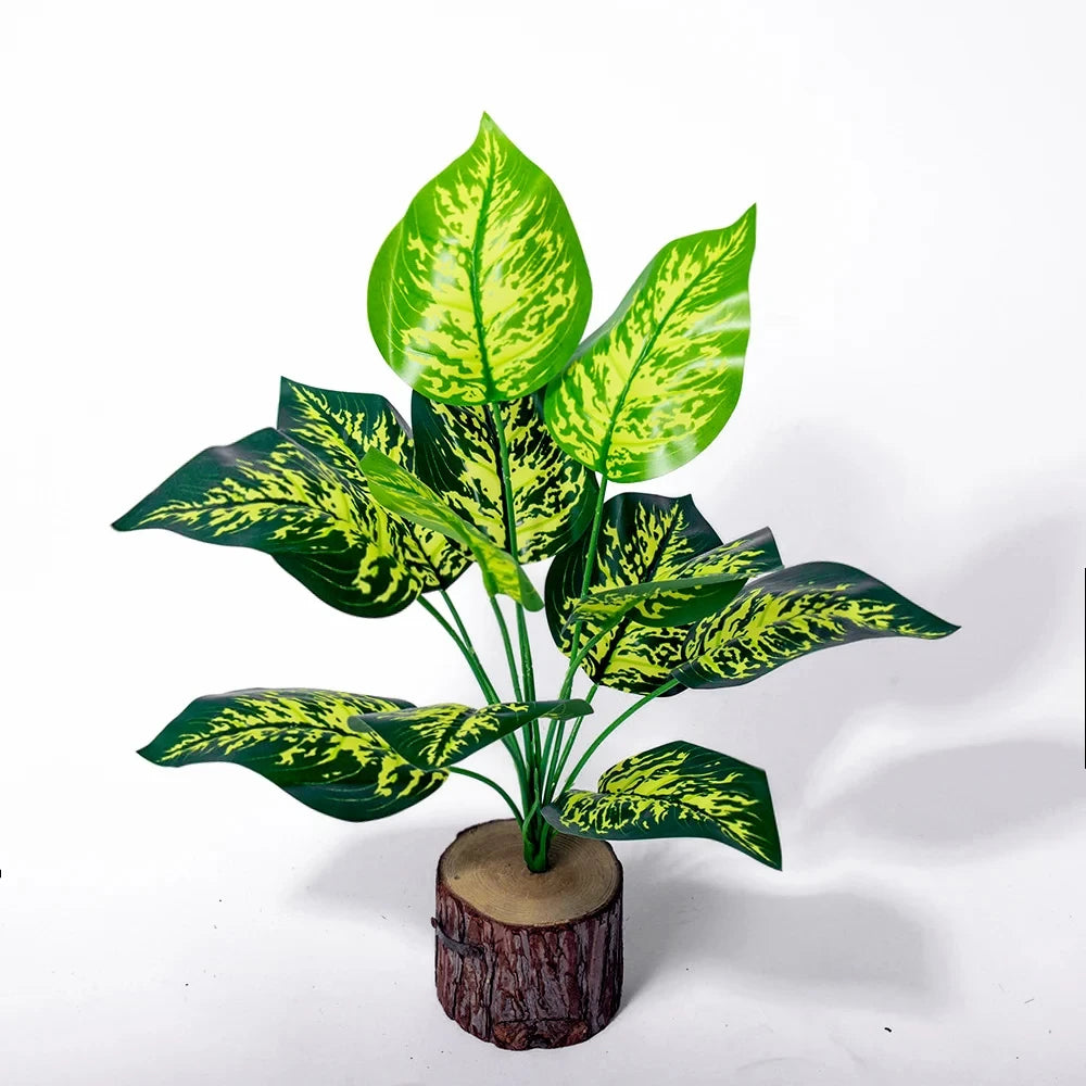 Artificial Green Potted Plant with Variegated Leaves in a Rustic Wooden Pot
