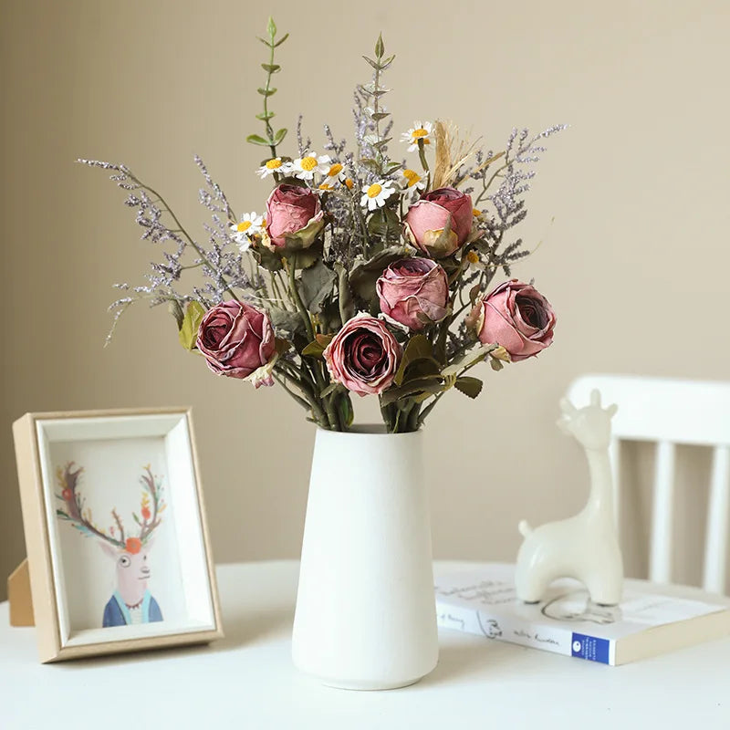 Artificial rose bouquet autumn featuring pink roses and wildflowers in a white vase