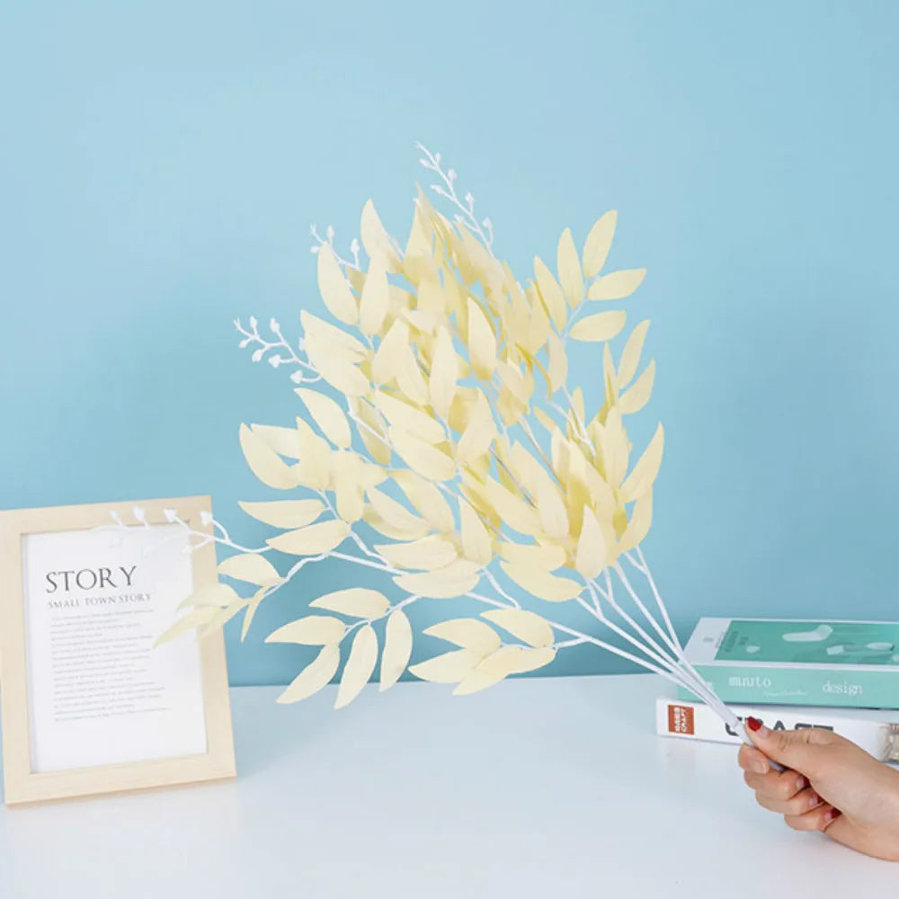 Artificial white flower decoration with delicate yellow leaves for home decor or event styling