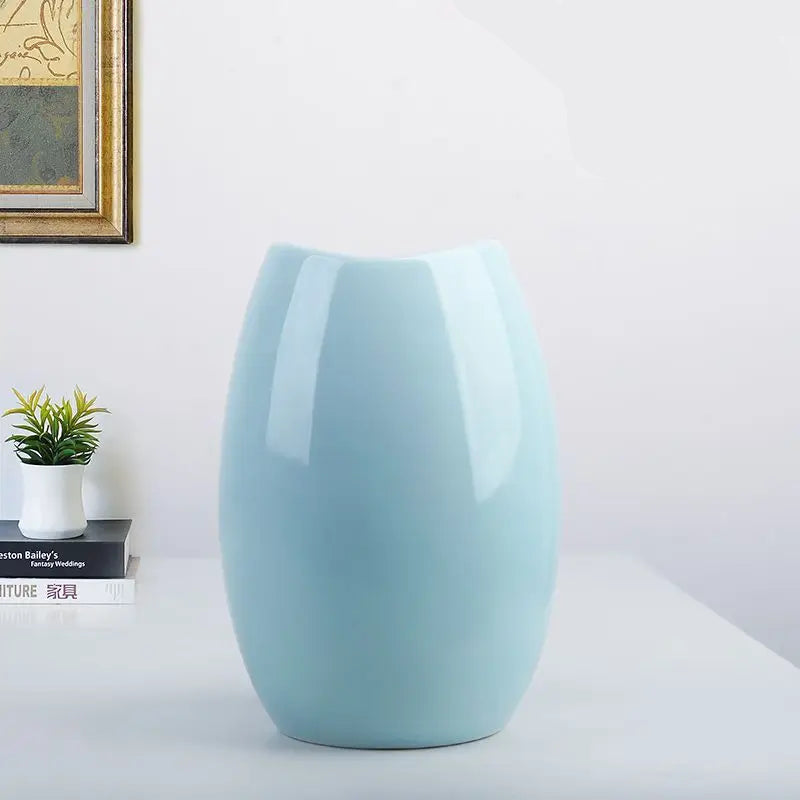 Light blue ceramic vase by Mağazam ideal for modern home decor and floral arrangements