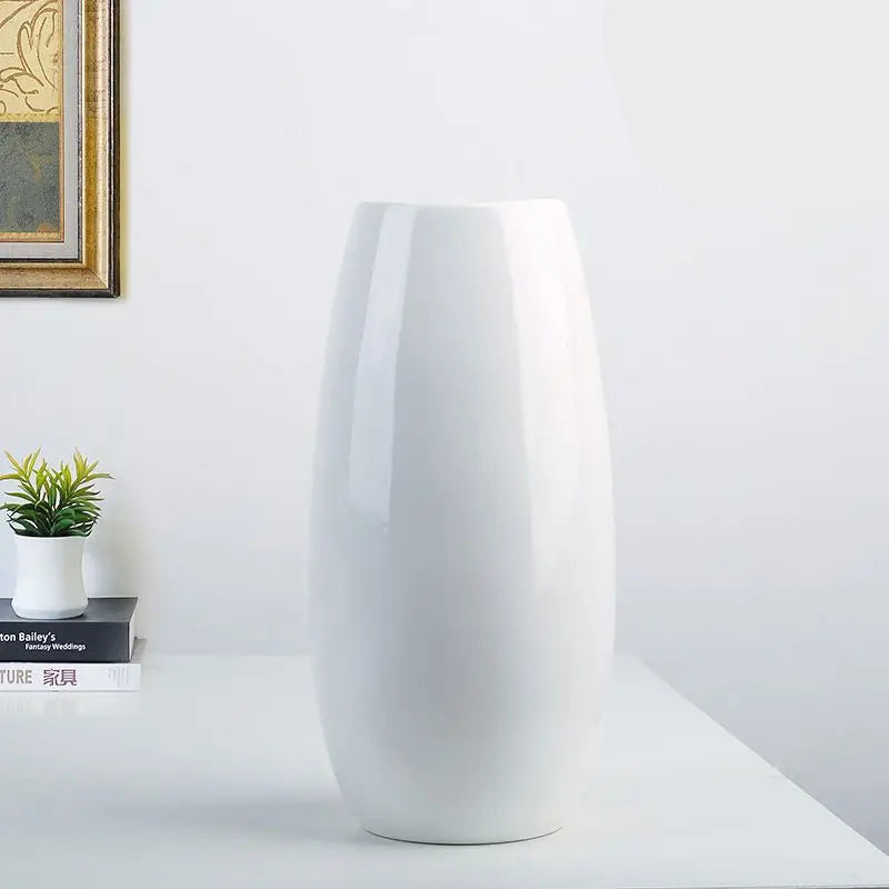 Elegant white ceramic vase from Mağazam, perfect for modern home decor and floral arrangements
