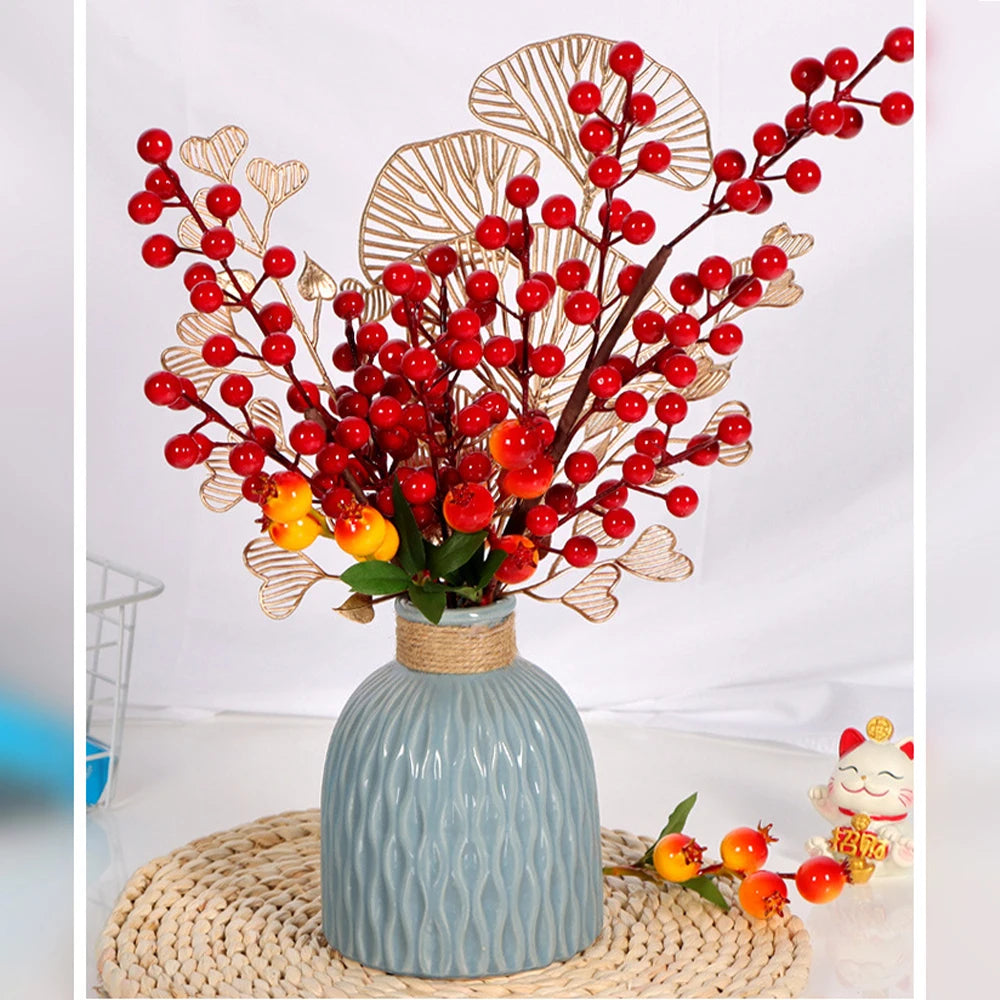 Decorative red berry artificial flower arrangement in a blue textured vase for home decor