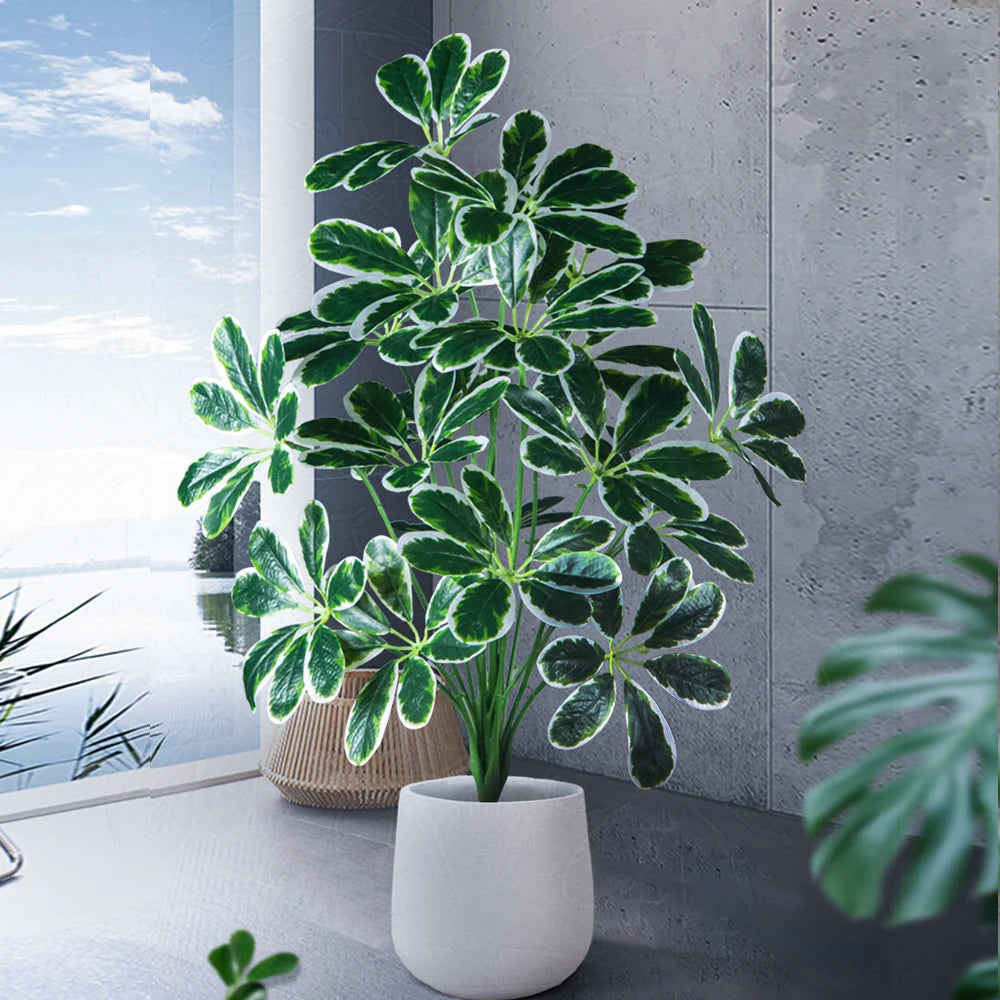 Beautiful artificial potted plant with variegated leaves for indoor decoration