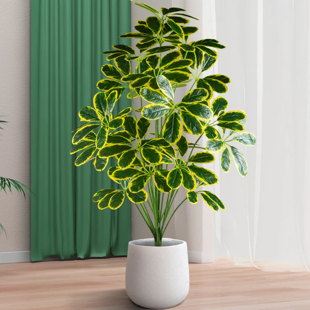 Artificial Plant with Lush Green Leaves in a White Pot for Home Decor