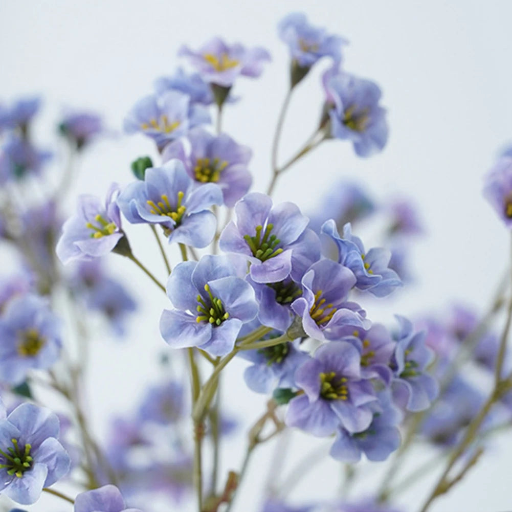 Beautiful purple fake flower table decorations for elegant home decor and special occasions