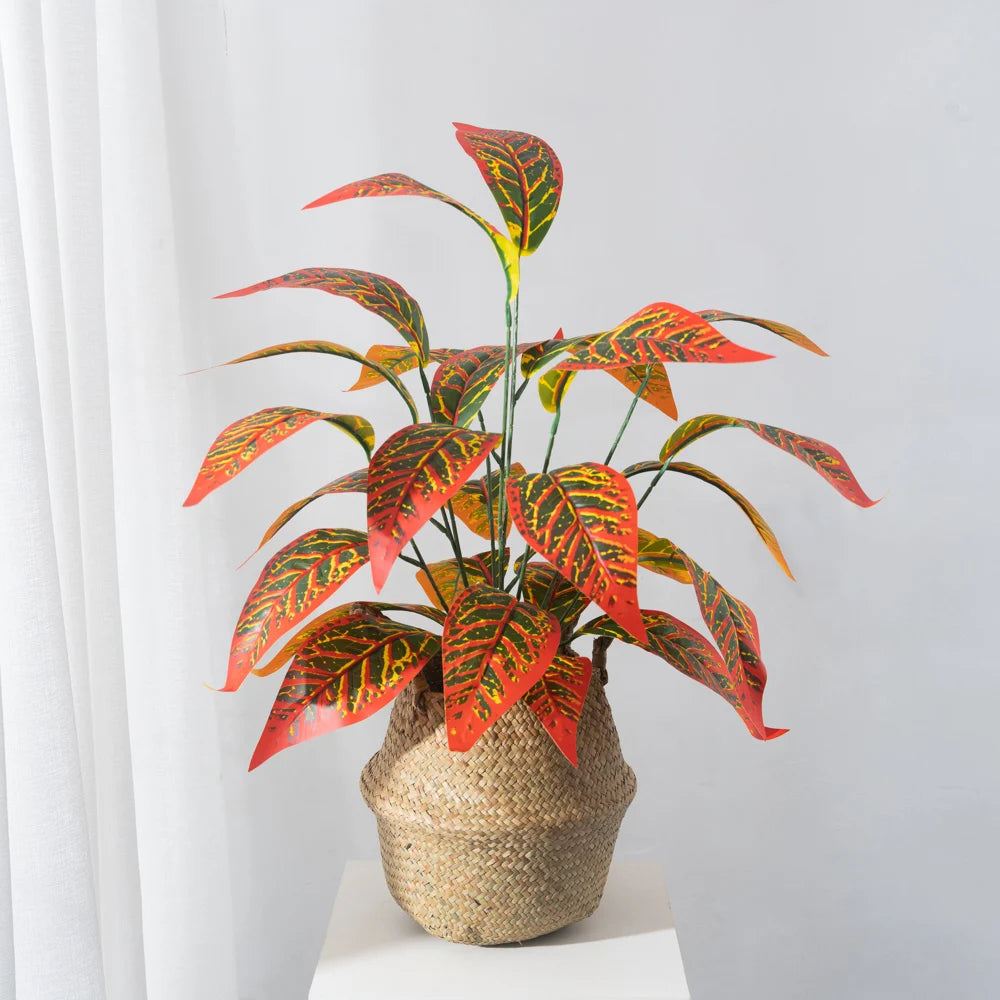 Colorful artificial plant in woven basket for home decor featuring fake magnolia branch decor