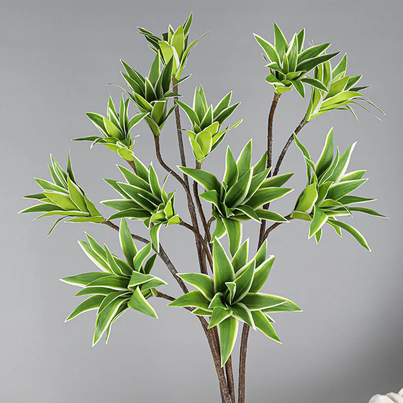 Artificial green plant with vibrant leaves in a decorative pot by Mağazam for home decor