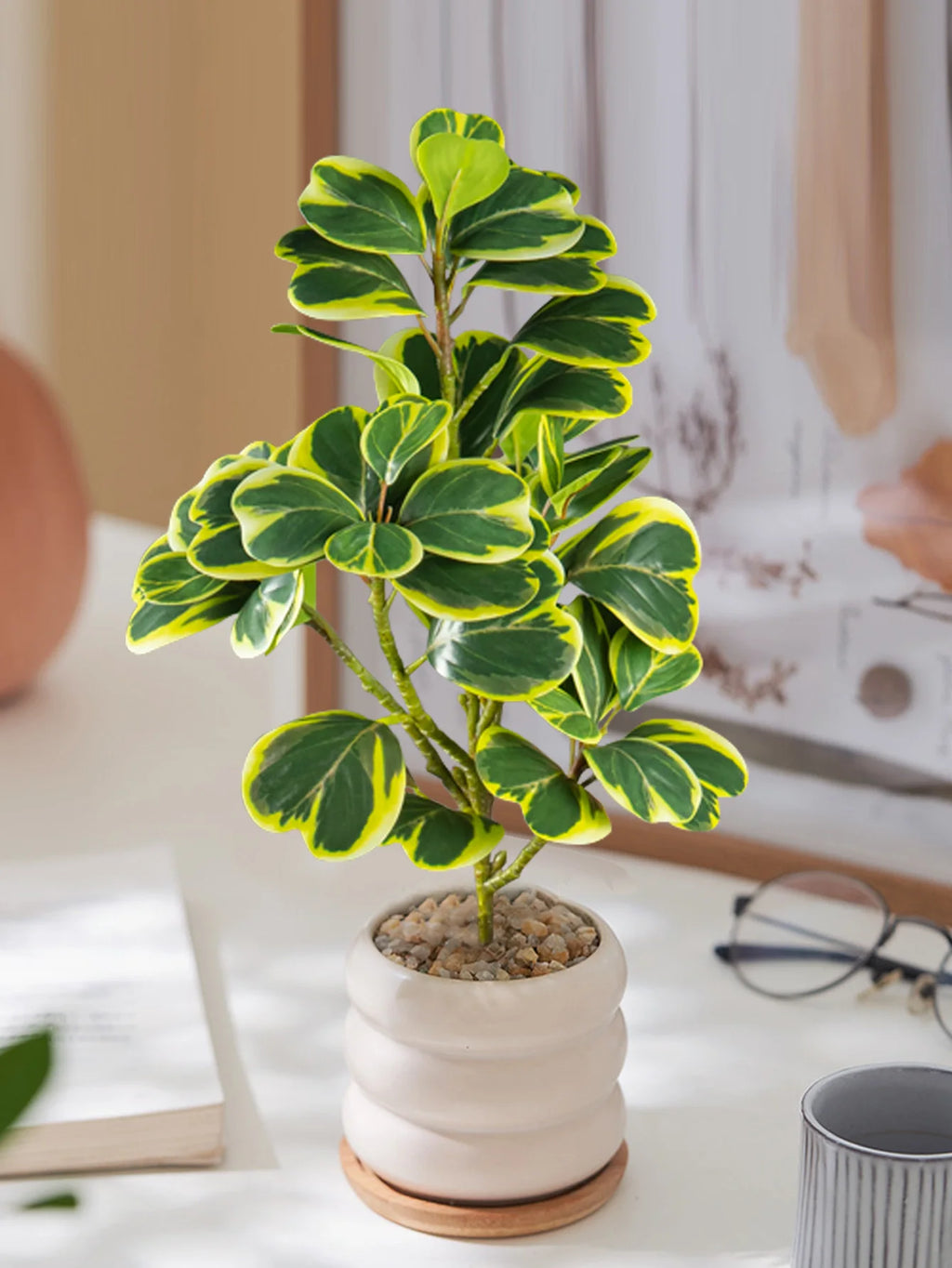 fake succulent home decor in a modern pot with green and yellow leaves for stylish interiors