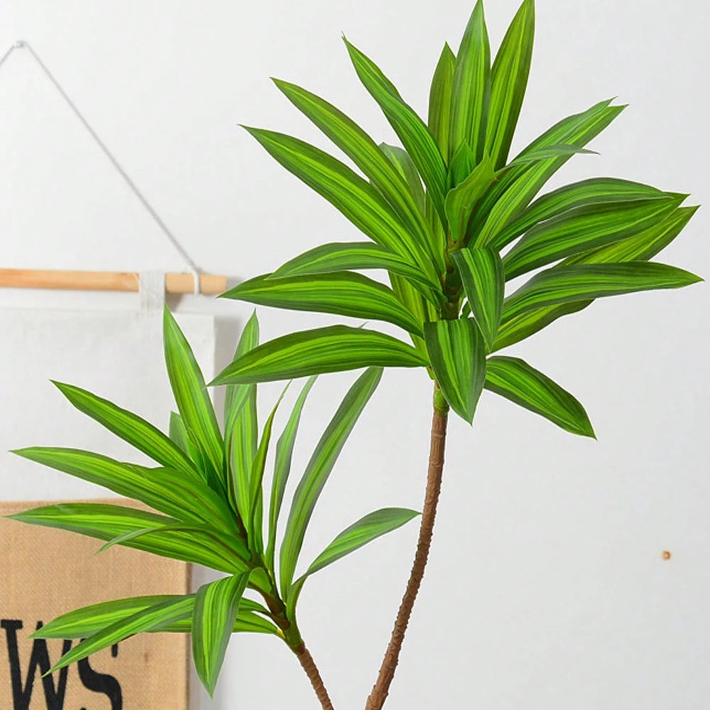 Realistic faux Brazilwood leaves in vibrant green for home decor and indoor plants