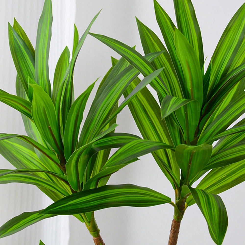 Lifelike faux Brazilwood leaves in vibrant green, perfect for indoor decor and easy maintenance