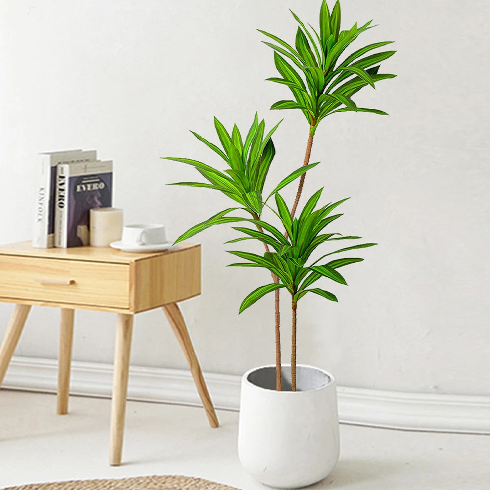 Elegant faux Brazilwood leaves plant in a white pot for home and office decor