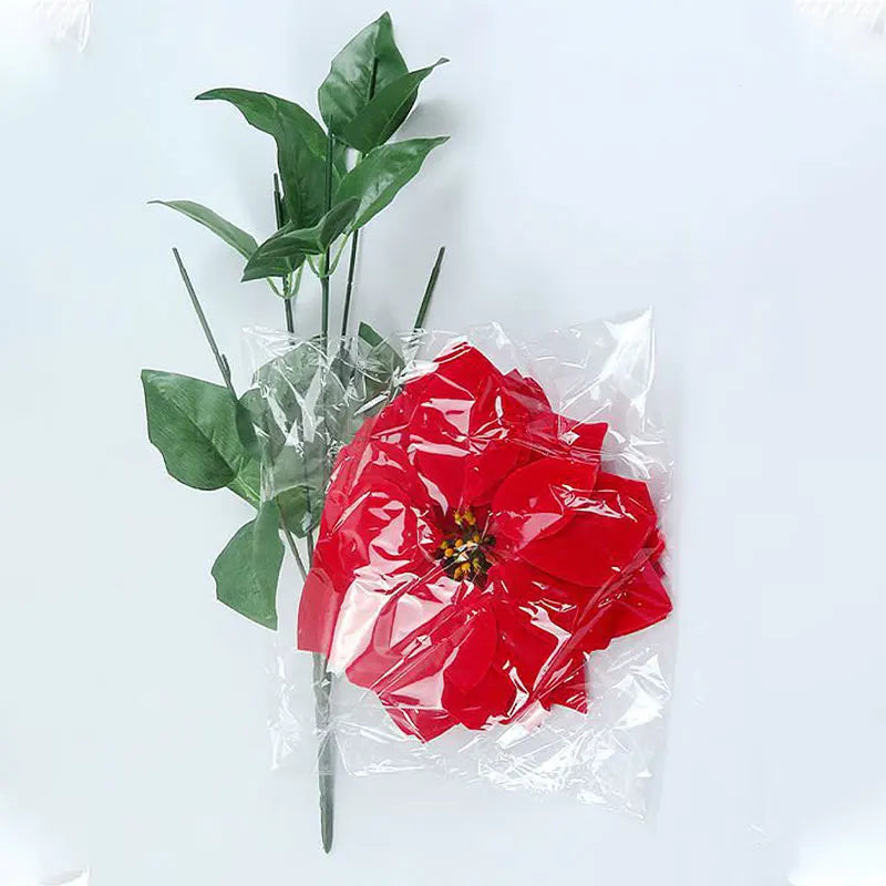 Artificial red flower bouquet with green leaves, perfect for home decor and arrangements