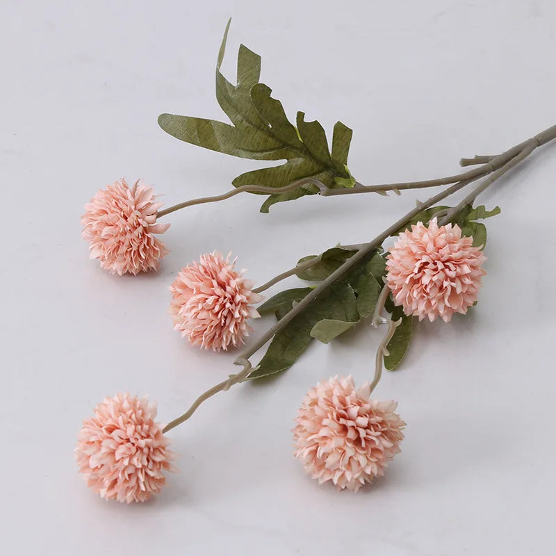 artificial peach pom pom flowers with green leaves for home decor or floral arrangements
