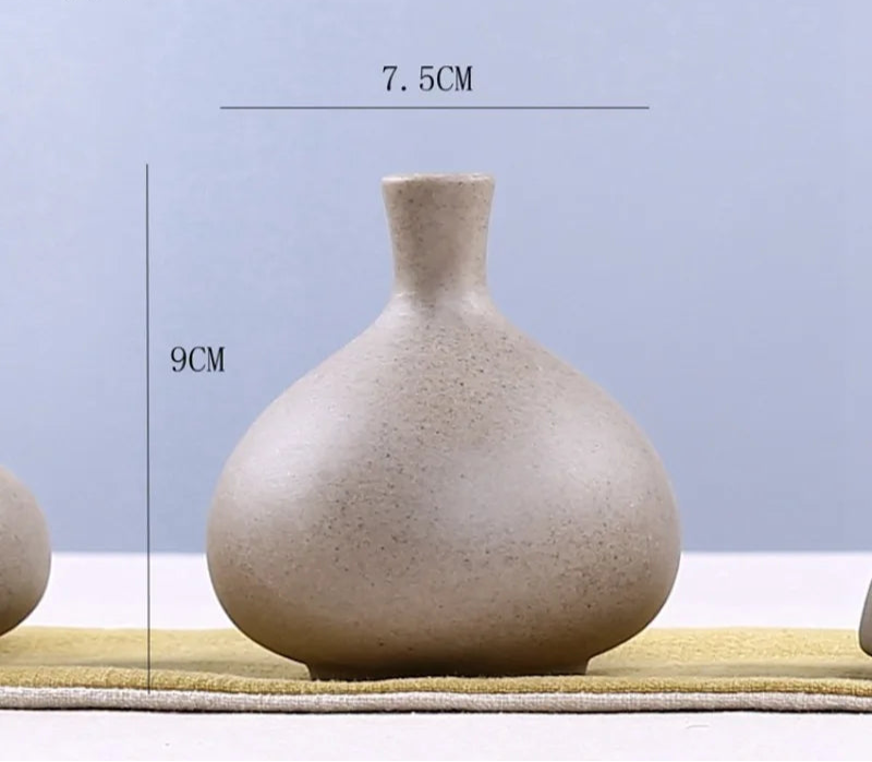 Set of grand ceramic vases in neutral tones, perfect for home decor and centerpiece arrangements