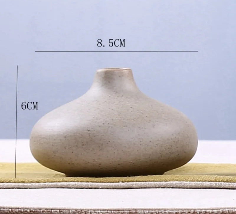 Elegant grand ceramic vases in a natural finish, measuring 8.5cm wide and 6cm tall