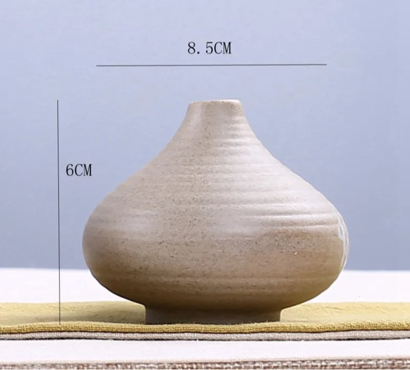 Elegant grand ceramic vases in neutral tones with a smooth finish for home decor