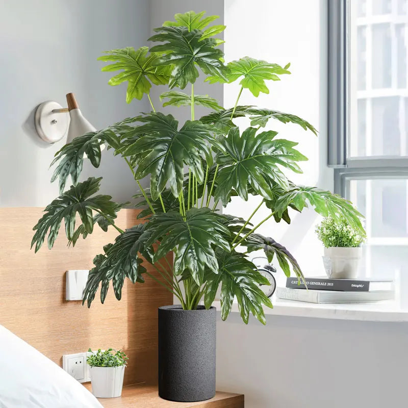 Jannaflora Indoor Faux Plant with Large Green Leaves in a Modern Black Pot for Home Decor