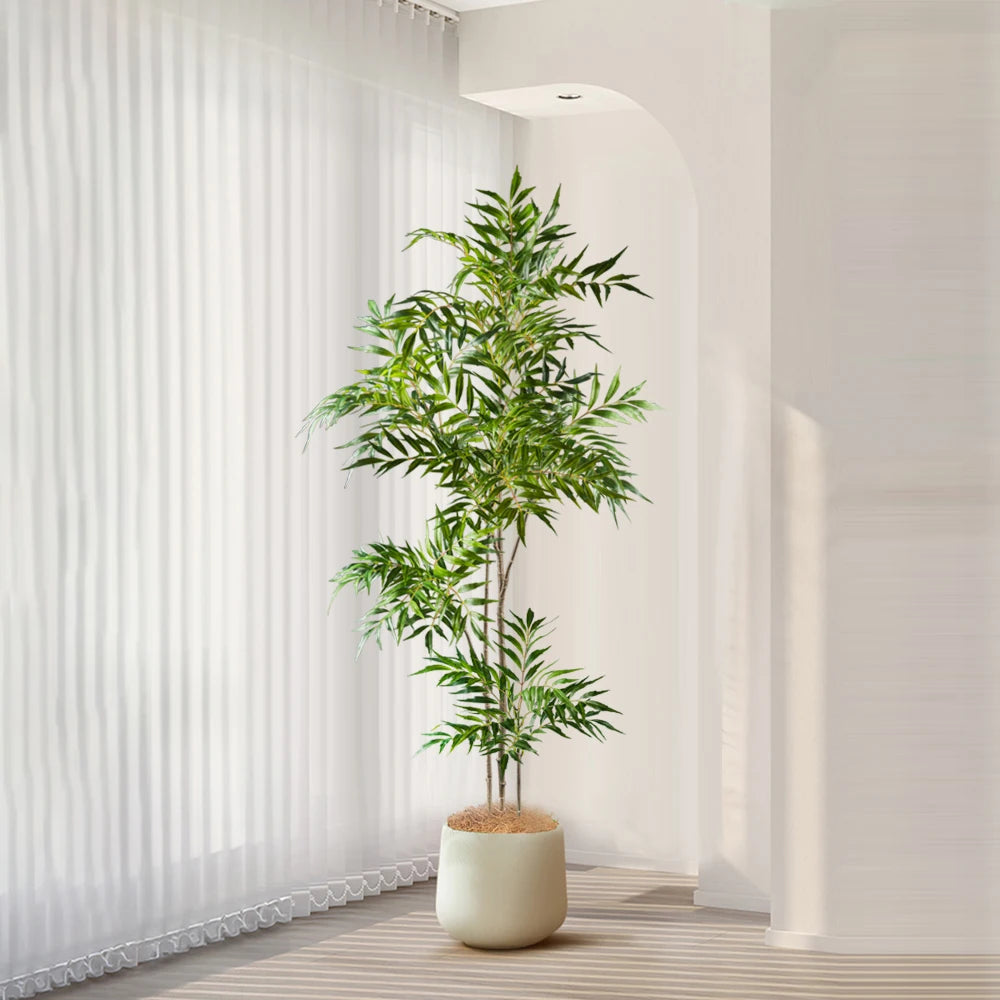 Artificial indoor palm tree in a modern white pot for home and office decor