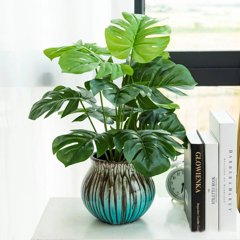 Artificial Monstera Plant in a Decorative Blue Ceramic Pot for Home Decor