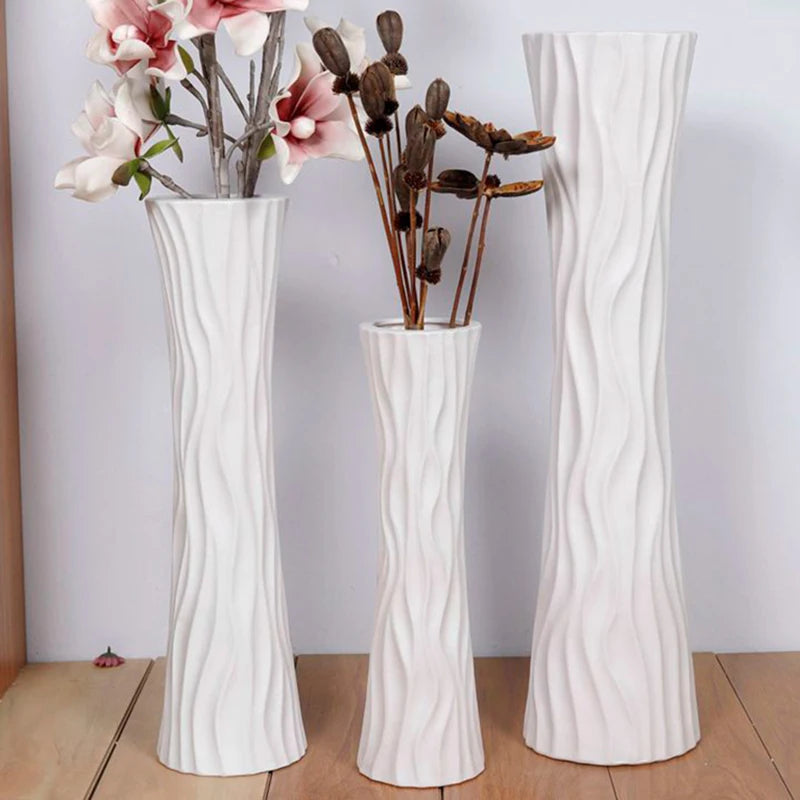 Set of three elegant white vases for modern decor featuring a luxury Ikebana floor vase design
