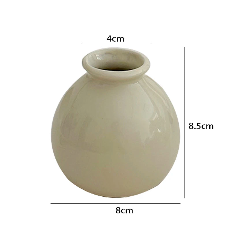 Modern mini flower vase in cream color, 8.5cm tall and 8cm wide, perfect for decorative arrangements