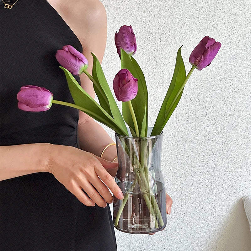 Elegant Nordic glass vase decor featuring vibrant purple tulips for stylish home decoration