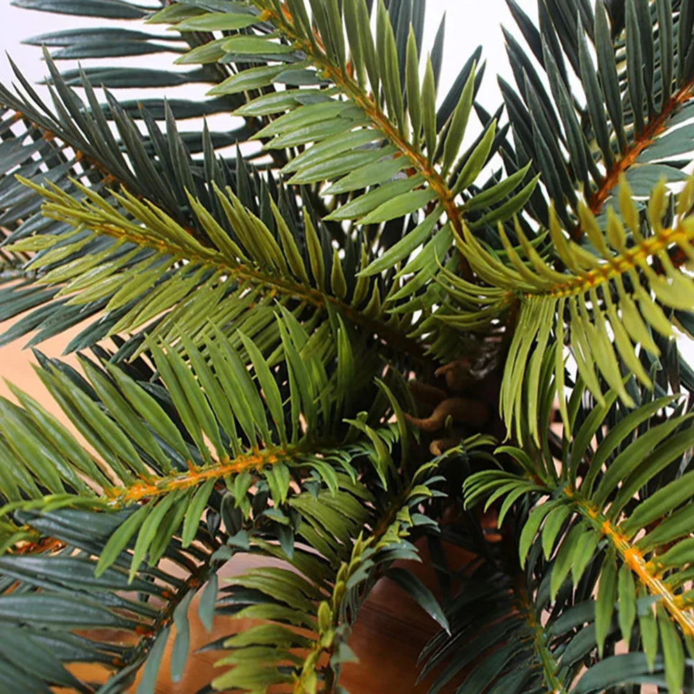 Artificial palm plant with lush green leaves for home or office decor