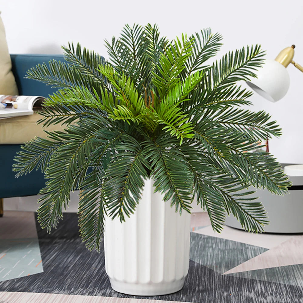 Artificial Green Fern Plant in a White Ribbed Pot for Home Decor and Indoor Spaces