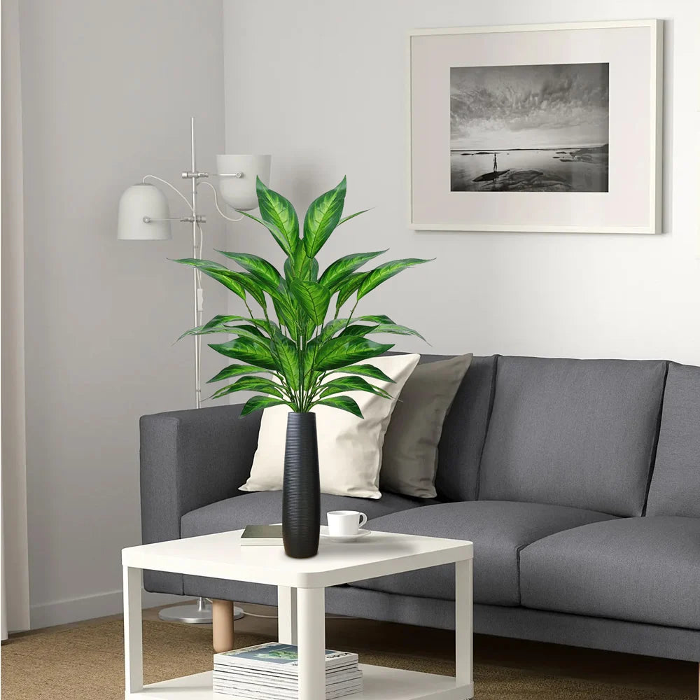 Artificial Potted Plant in a Modern Black Vase for Home Decor