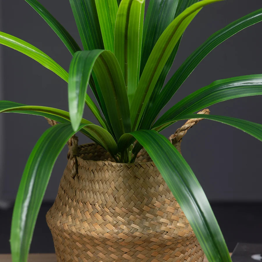 Artificial indoor plant in a woven basket, perfect for home decor and adding greenery to any space