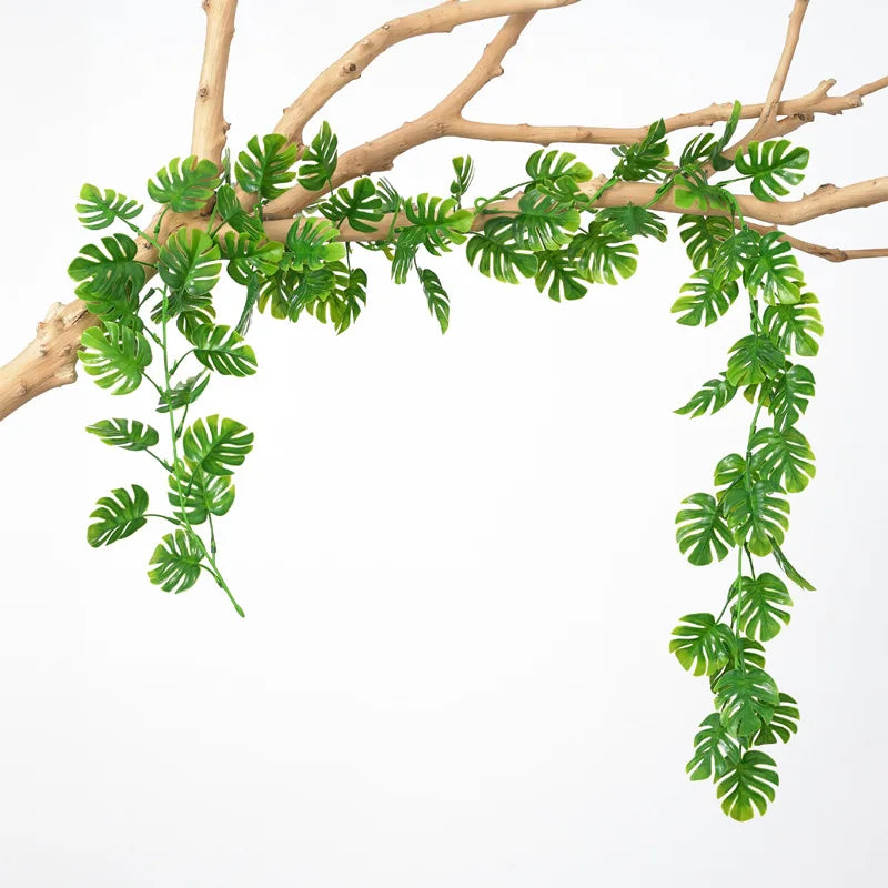 Artificial plastic turtle leaf garland with vibrant green leaves for home decor and DIY projects