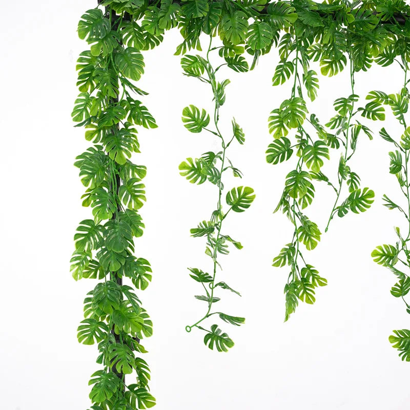 Plastic turtle leaf garland featuring vibrant green foliage for home decor and party decorations
