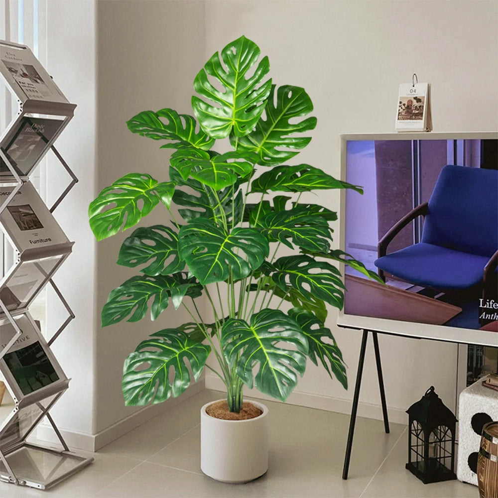 Plastic turtle leaf indoor plant in a decorative pot, adding vibrant greenery to modern home decor