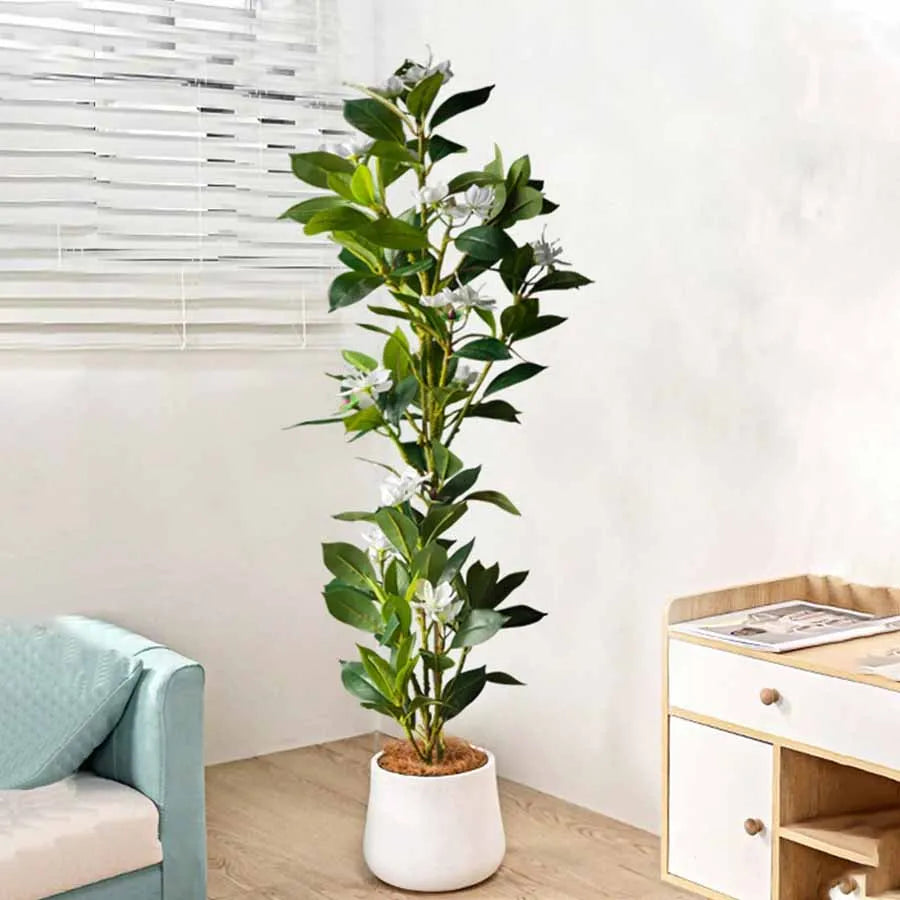 Artificial indoor plant by Mağazam featuring realistic green leaves in a stylish white pot
