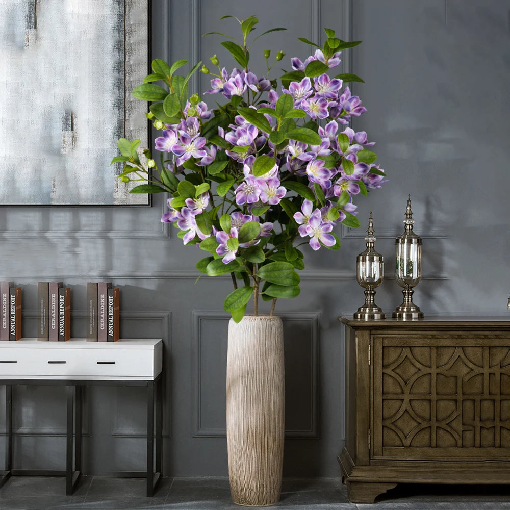 Jannaflora Artificial Flower Arrangement in Elegant Vase for Home Decor with Purple Flowers and Green Foliage