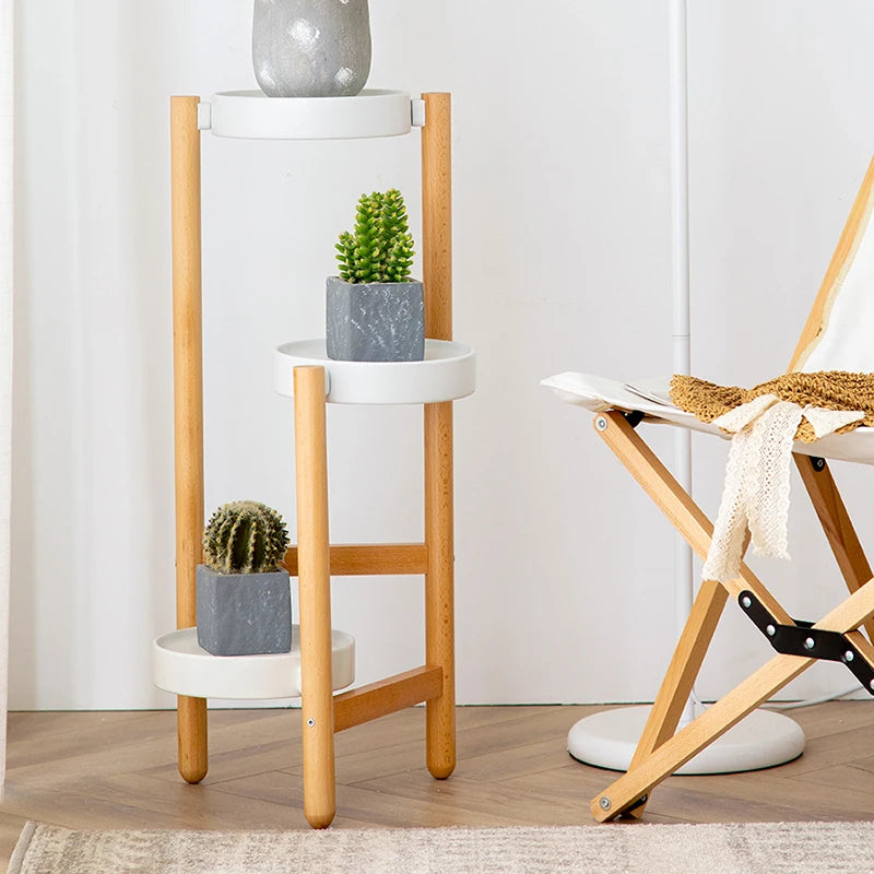 Nordic solid wood plant shelves with white circular pots and decorative cacti for modern home decor