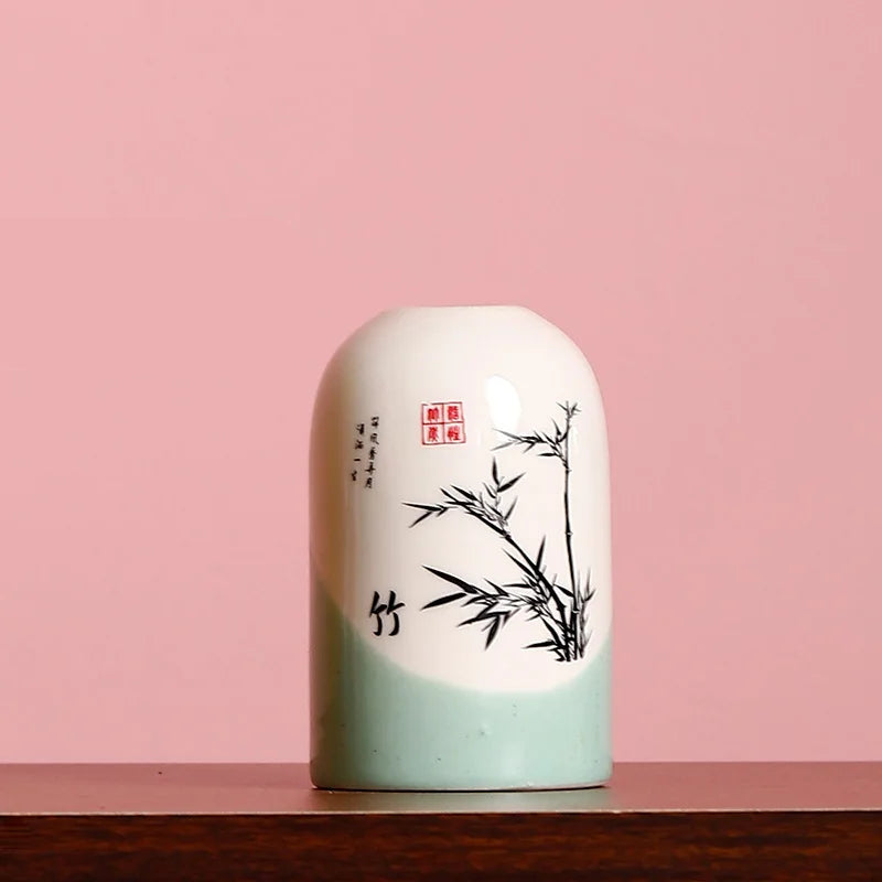 Vintage small flower vase with bamboo design, perfect for holding delicate blooms