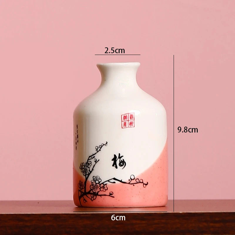 Vintage small flower vase in pink and white with cherry blossom design, ideal for home decor